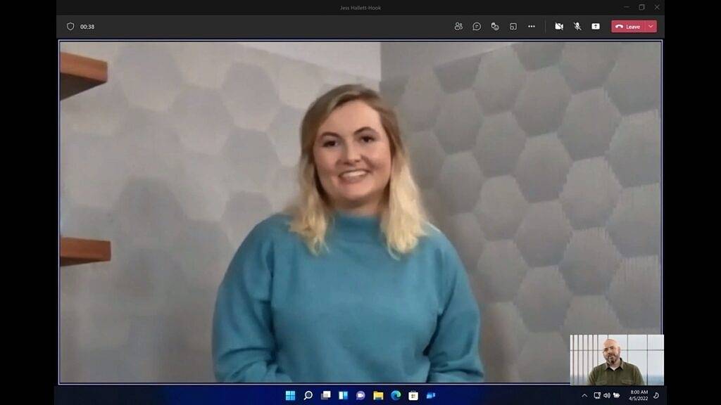Woman-standing-in-front-of-a-wall-during-a-Teams-call-1024x576-1