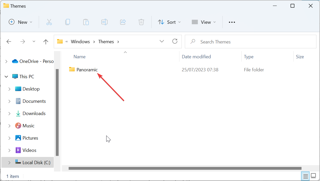 主题背景位于 Windows 11 中的什么位置?