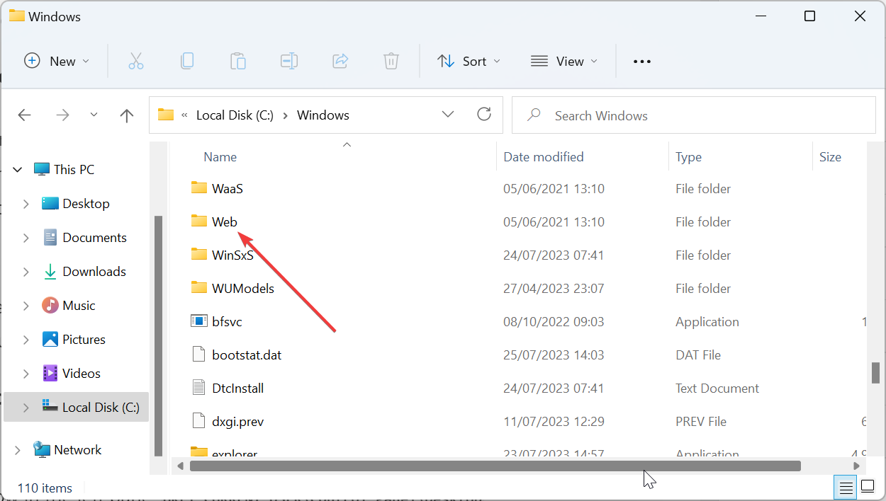 主题背景位于 Windows 11 中的什么位置?