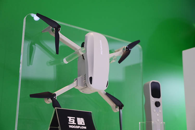新未来：互酷车载无人机在进博会上展示摩旅探索之旅